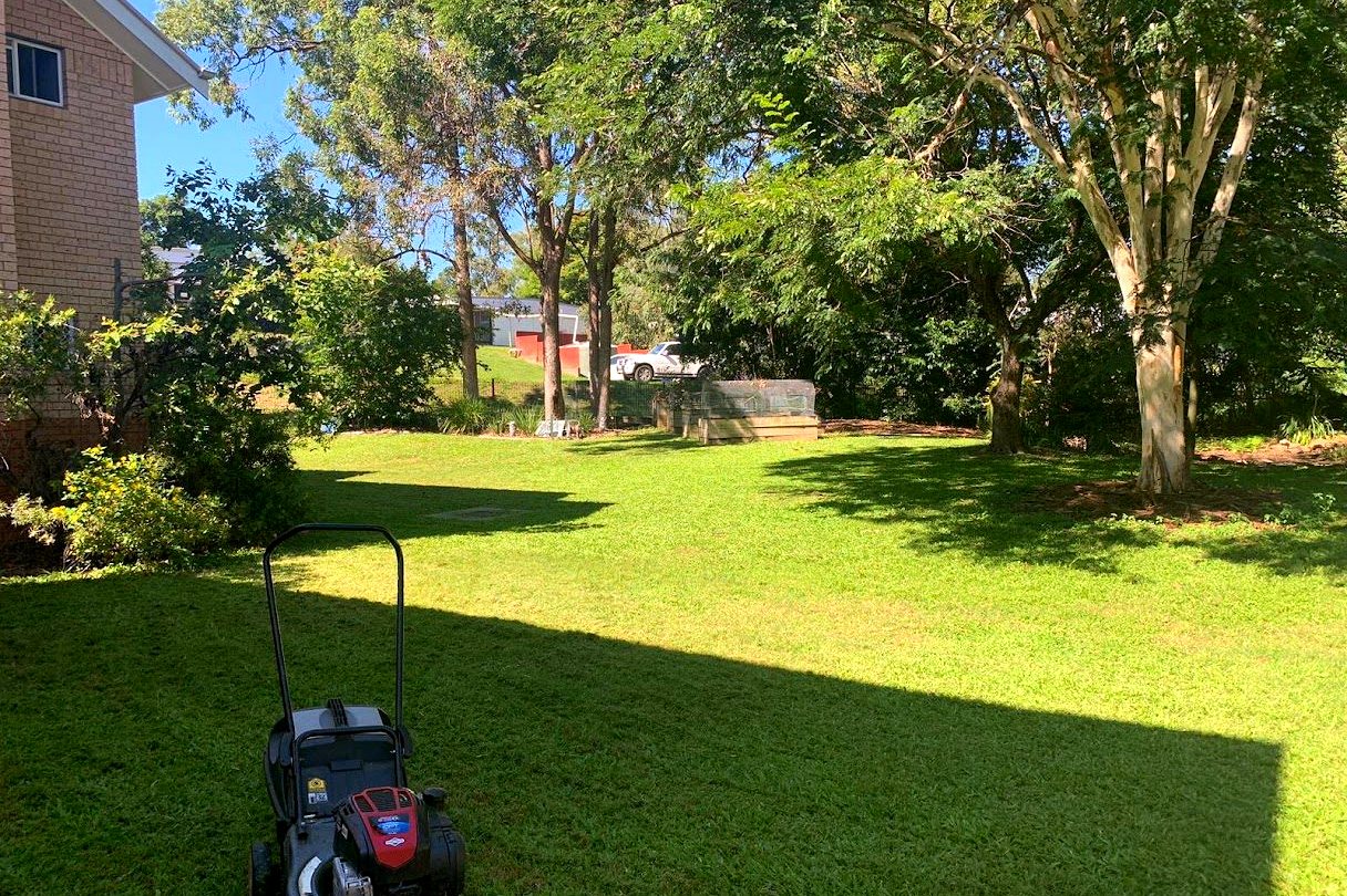 Mower on a freshly cut lawn at a Broadfield-maintained property